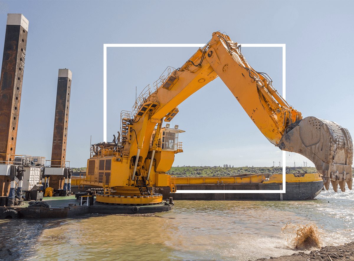 Yellow crane by the water